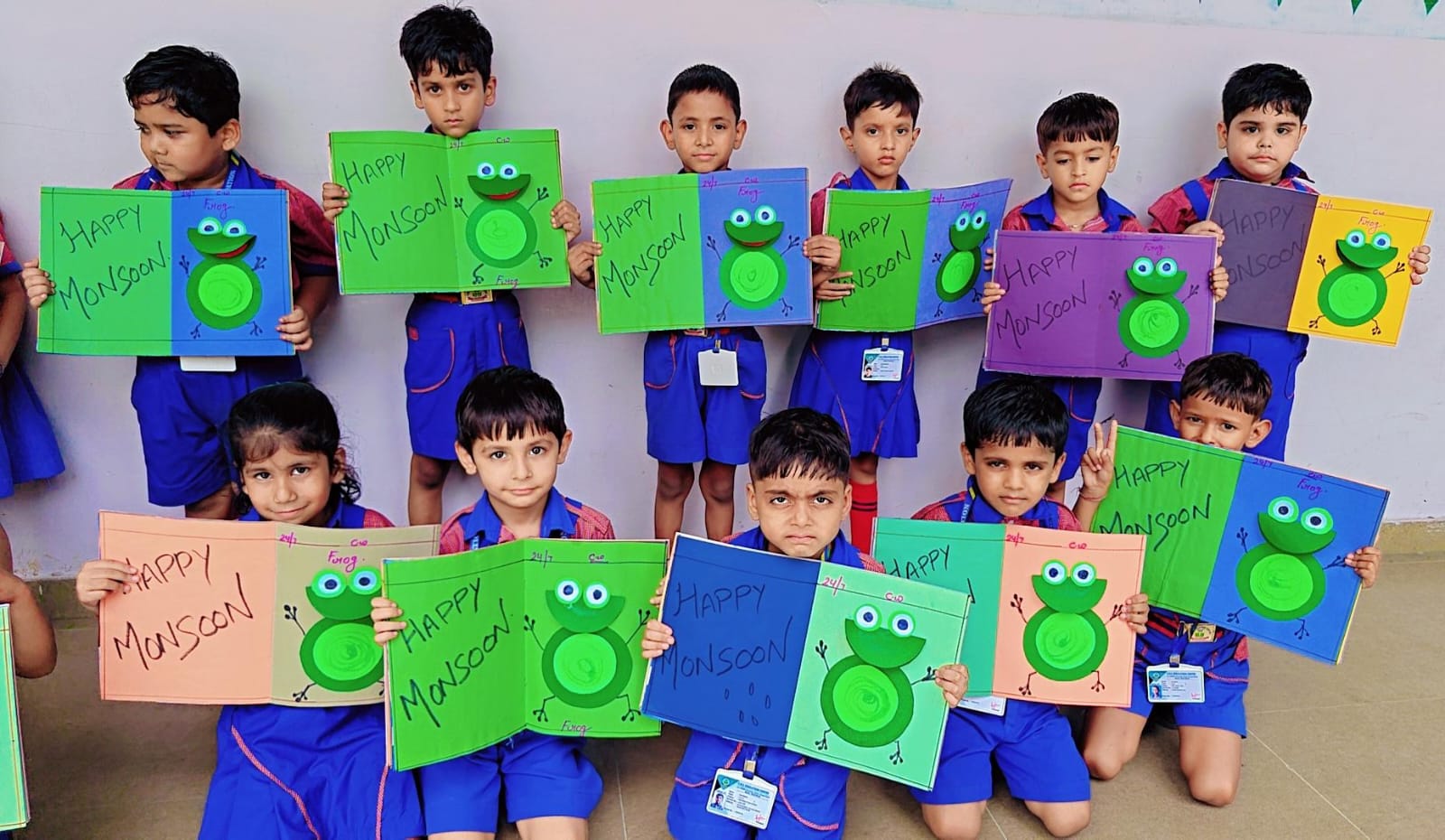 Happy preschool children playing with blocks together in a bright classroom